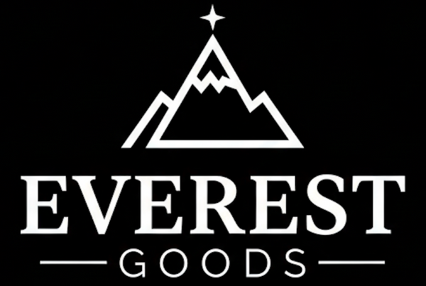 Logo of Everest Goods with a mountain design on a black background